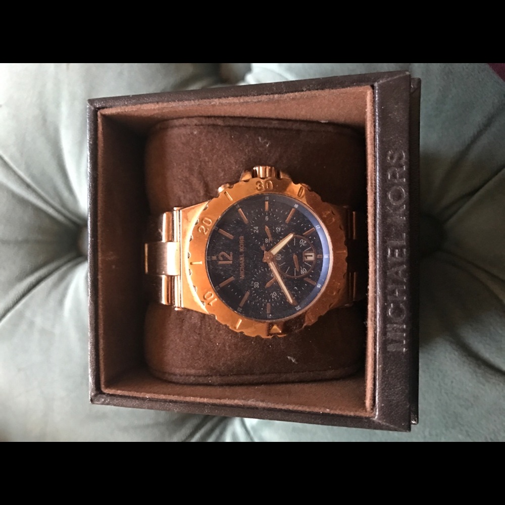 Rose gold blue faced Michael kors watch